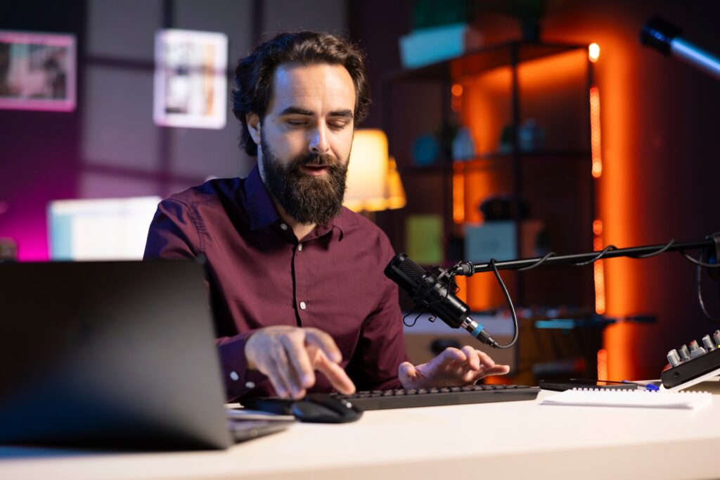 Tech guru filming tutorial, presenting helpful keyboard shortcuts
